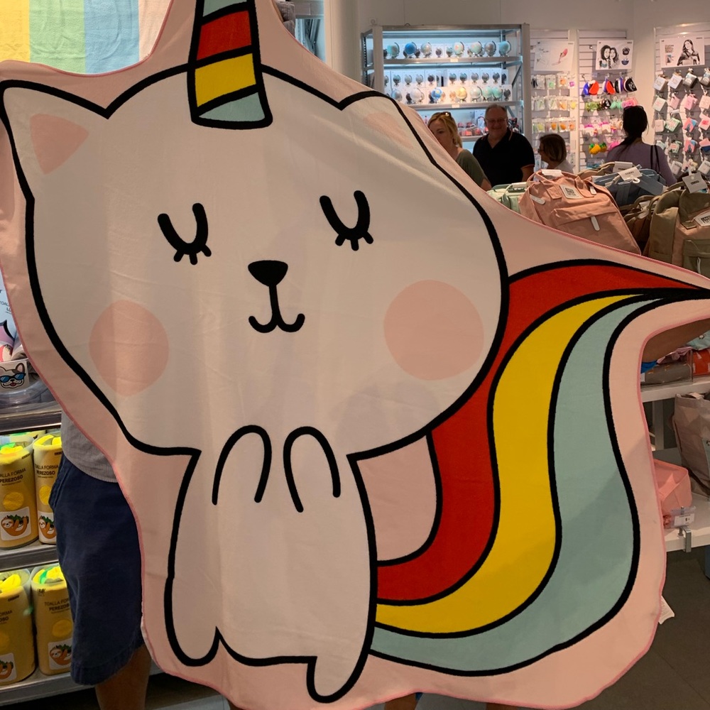 Beach towel shaped like a Unicorn